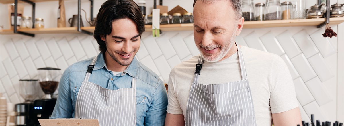 Two chefs working in a kitchen.