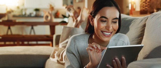 A woman engaging with an iPad as the header of Studio Science's 2025 CX Trends Report.